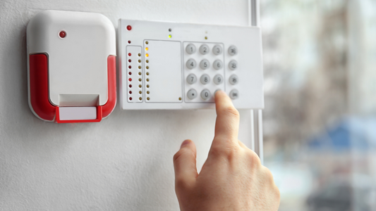How Can Families Combine Wearable Alarms and Home Base Units for Layered Protection? 